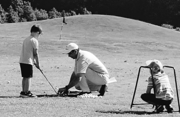 Kids playing golf